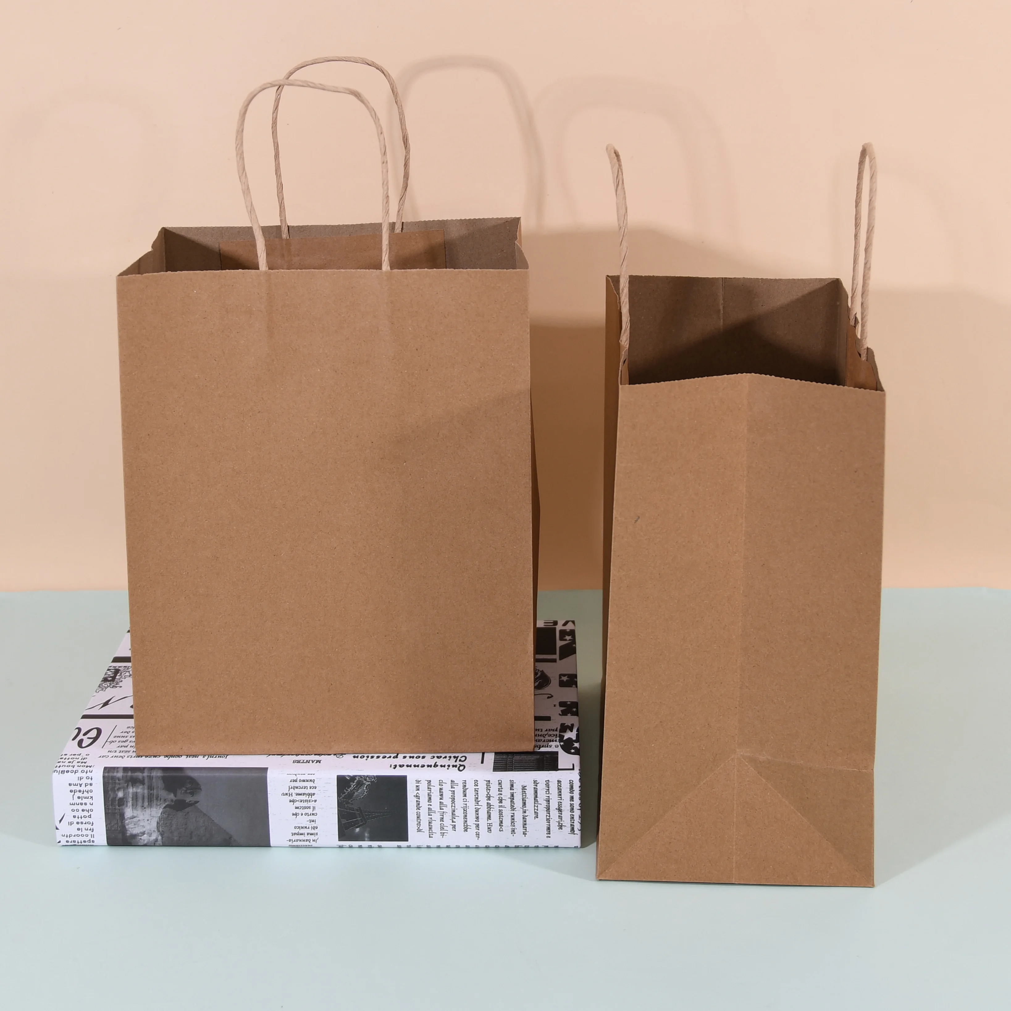 Eco-friendly Reinforced Handle Craft Paper Bags Custom Printed Logo Solid Durable Bottom Brown Kraft Paper Bag