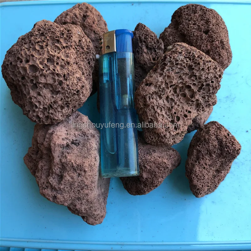 Red uniform granular volcanic rock for water filtration and river management