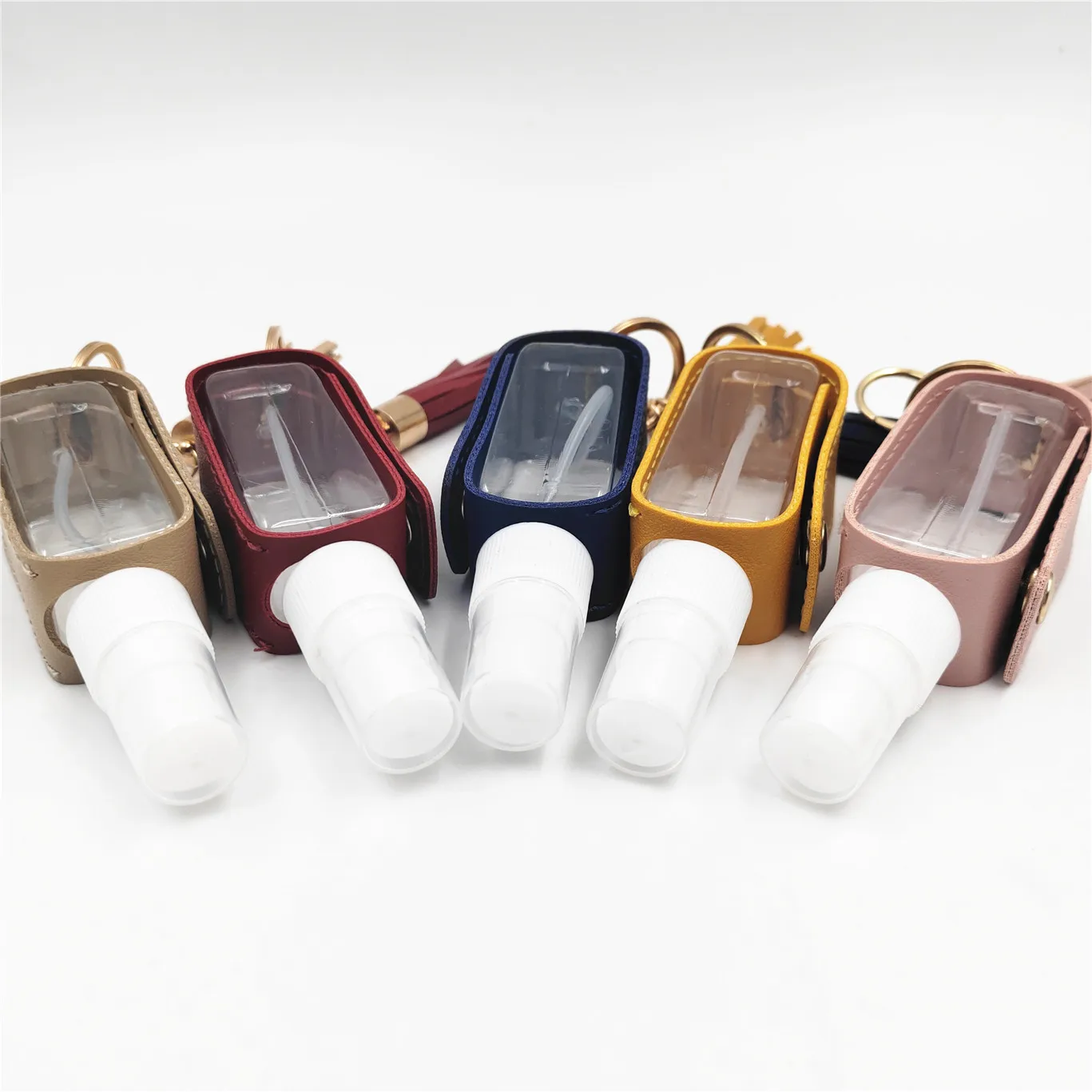 Pocket 30ml Mini Plastic Spray Hand Sanitizer Alcohol Pet Bottle with PU Leather Keychain Holder Plastic Bottle Manufacturer