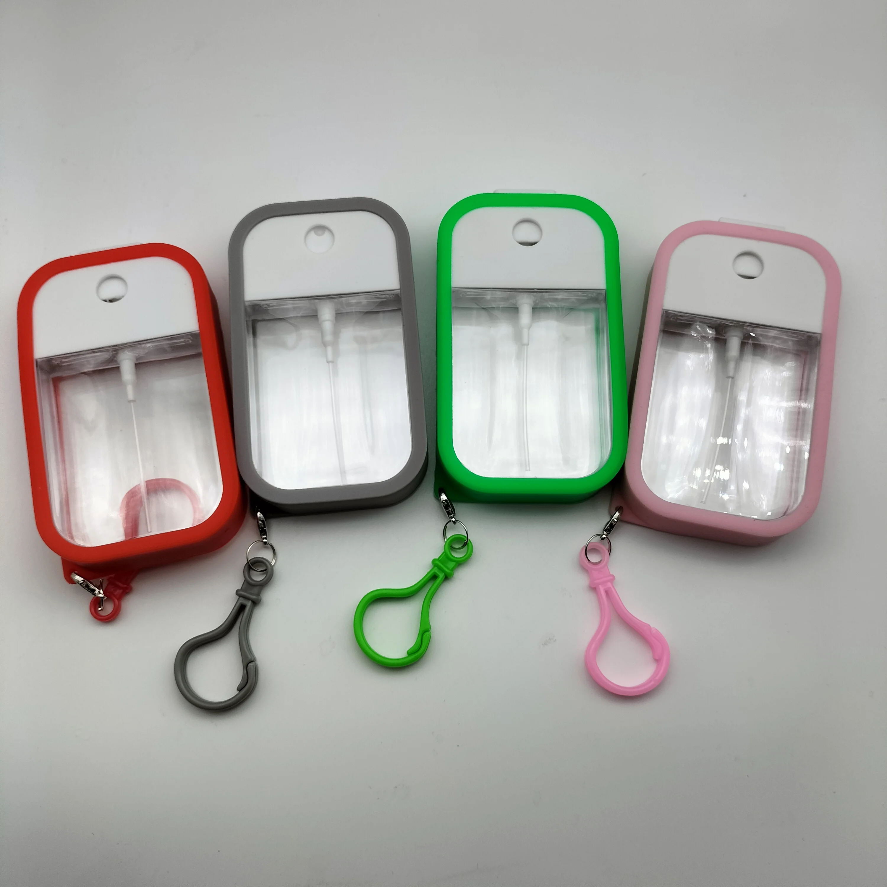 2021 New arrivals 50ml Pocket Sprayer Silicone Holder case Credit card Travel dispenser Holder case with key chain