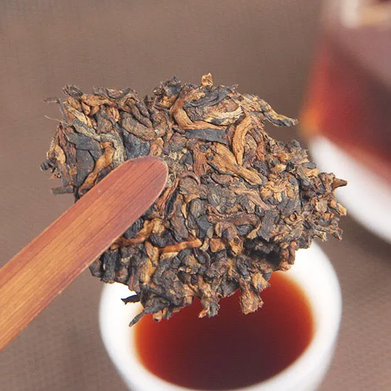 Hot selling Chinese shu puer tea cake 357 gram golden buds royal cake ripe Puerh Yunnan qi zi bing cha OEM order