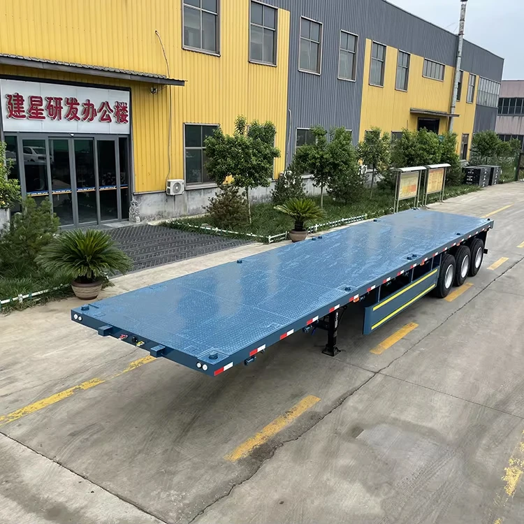 JIANXING High Load Capacity 3 Axles 40ft flatbed Chassis 40tons 60tons Flatbed Container  Semi Trailer For Sale