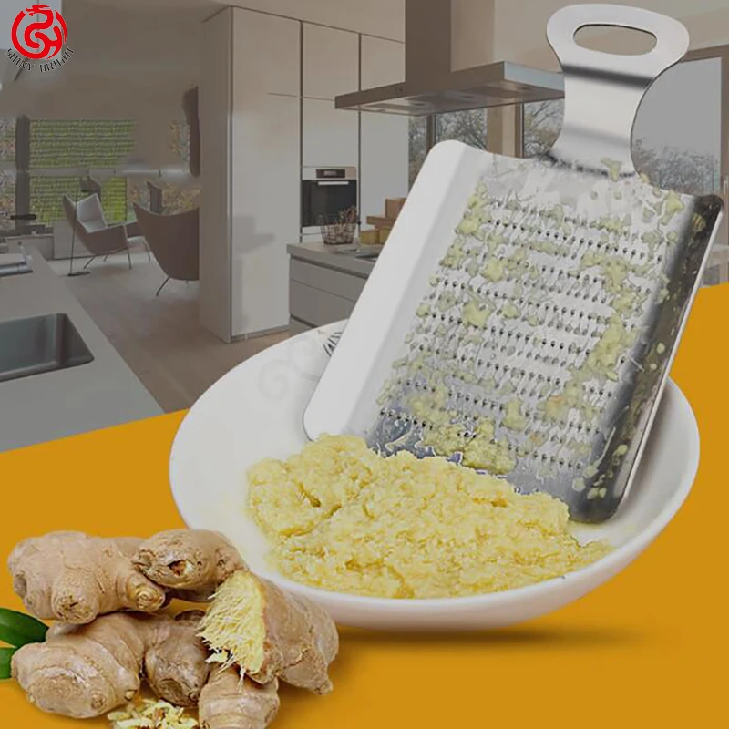 Wholesale and kitchen gadgets grinding the garlic creative household multi-functional stainless steel garlic press cutter