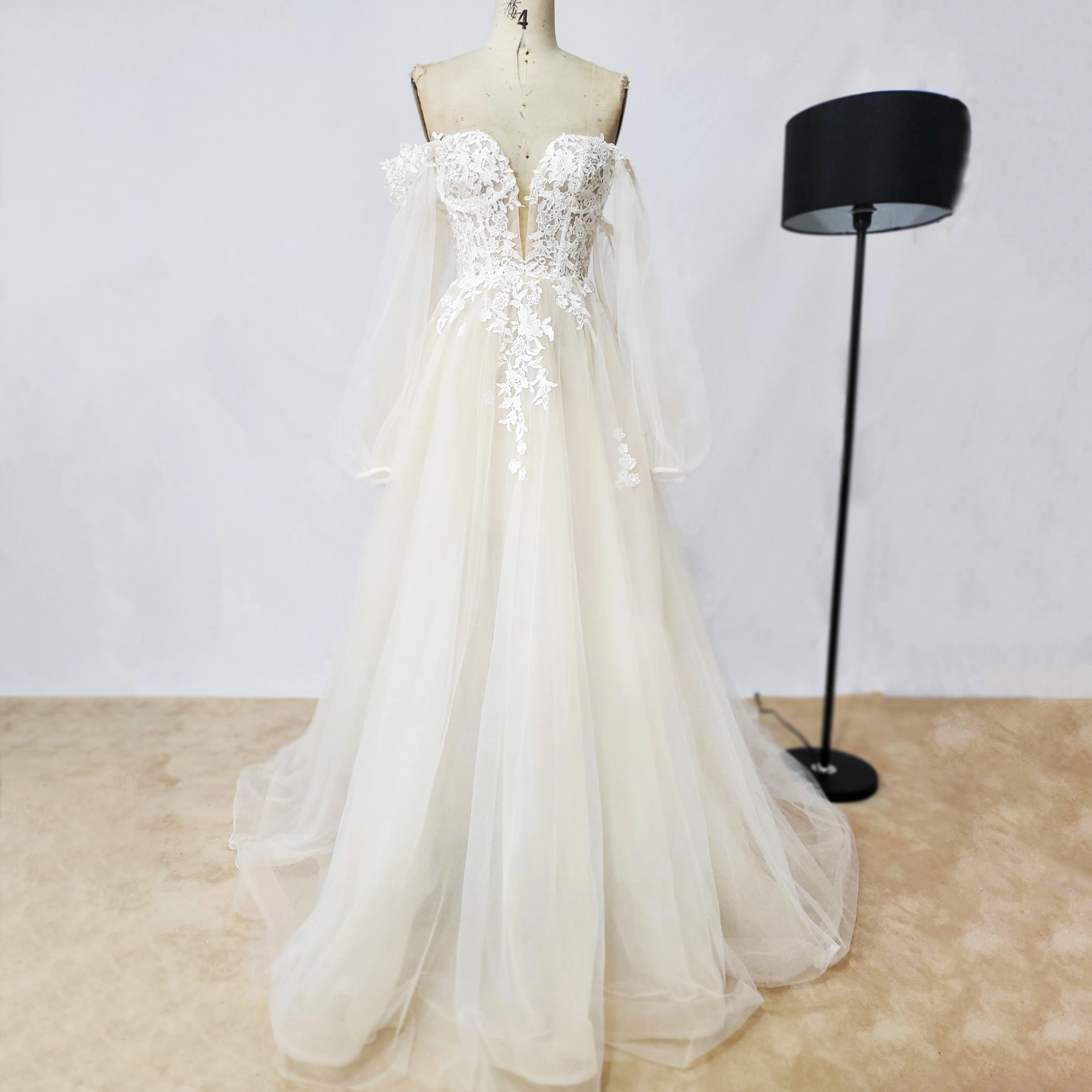 Chaozhou unique design off the shoulder embroidery long sleeves elegant beach wedding dresses