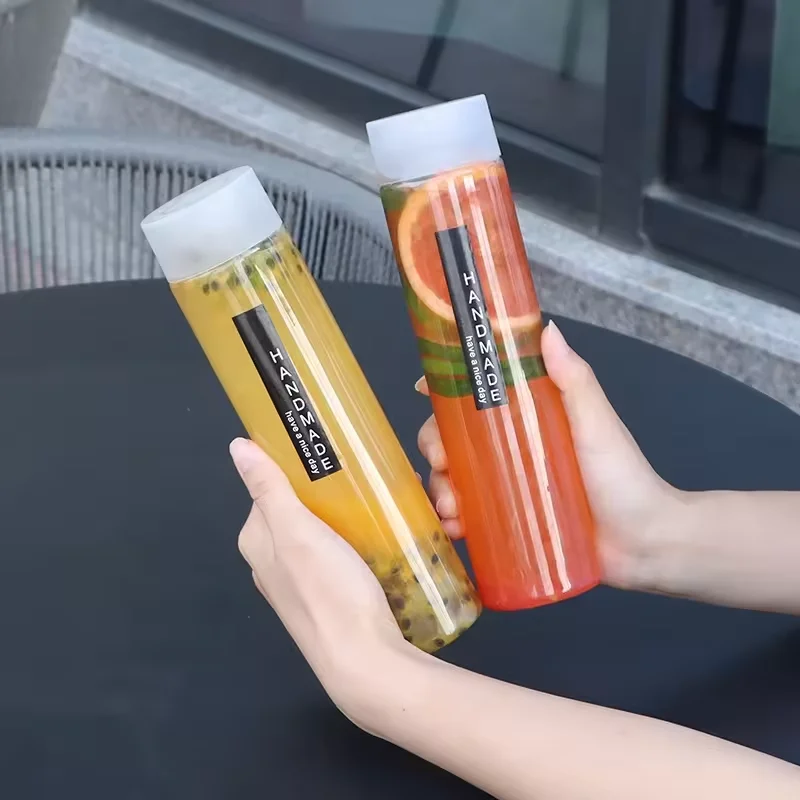 Wholesale disposable 500ml round palm cup pet plastic juice bottle with lid