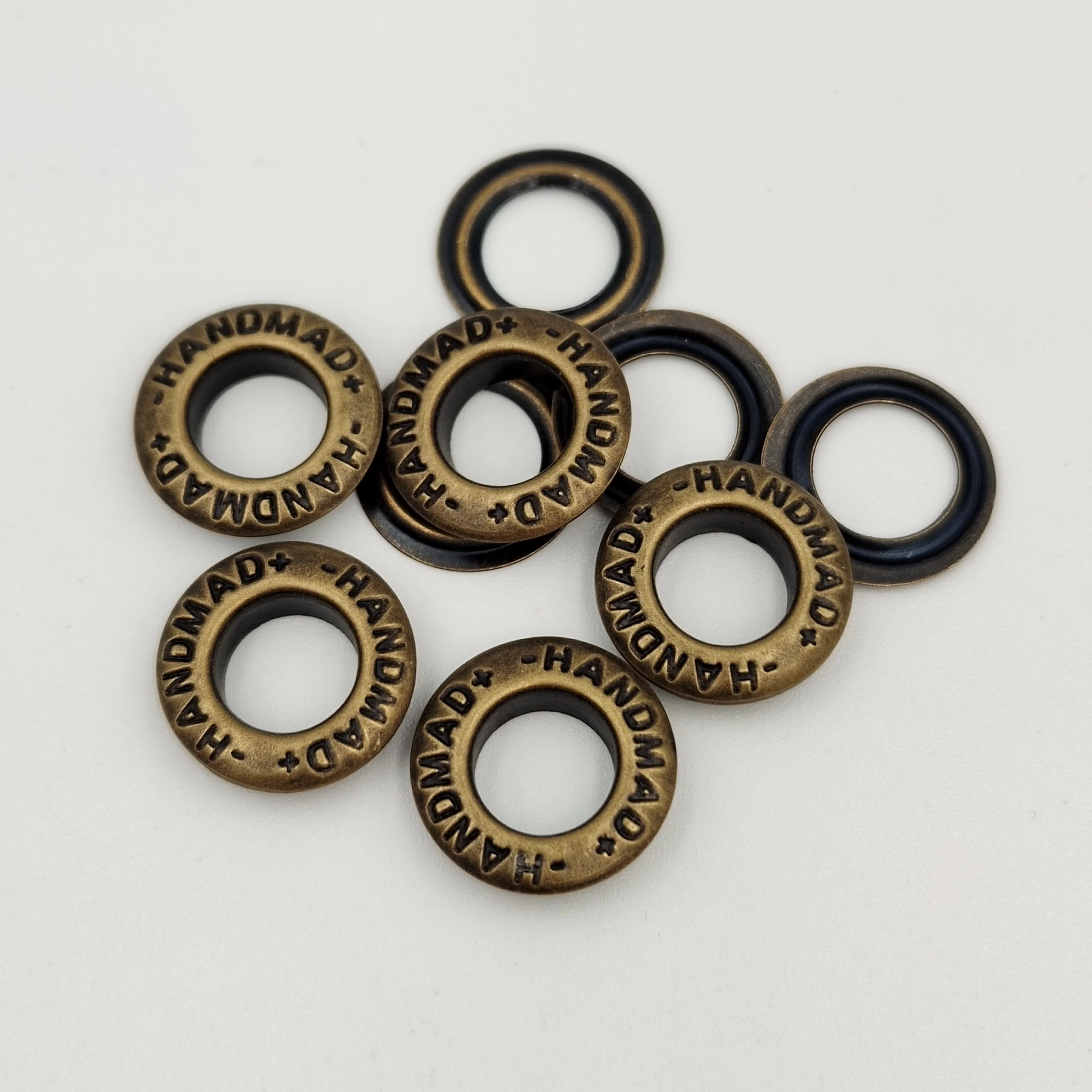 Custom engraved brand letter metallic brass eyelets and grommets