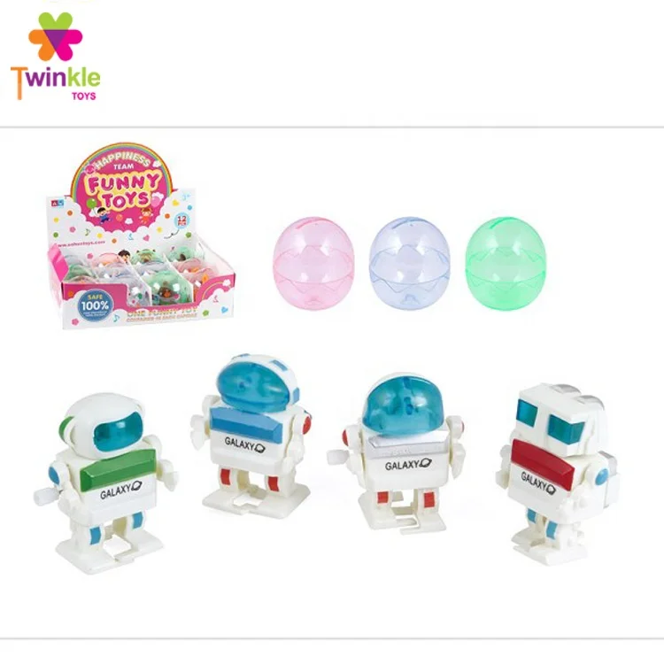 Twinkle kid toy plastic egg capsule promotional toy robot wind up toys