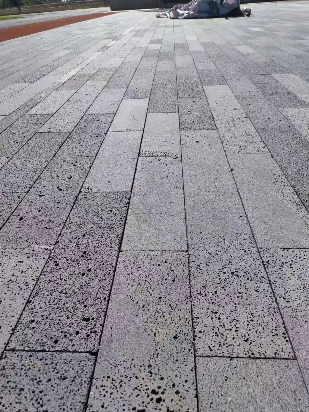 Volcanic lava stone rock tiles for outdoor flooring and wall