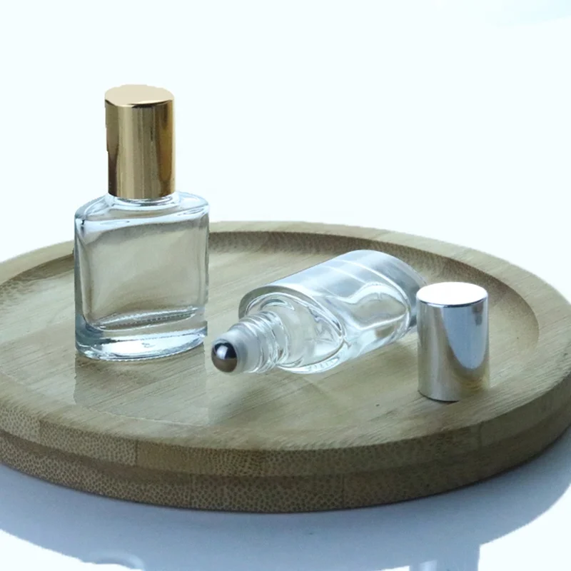 Unique Empty Small 8ml Skull Shape Clear Glass Perfume Essential Oil Roll On Mini Bottle Metal Roller Ball Bottles (NRB37)