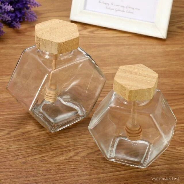 Hot Selling Product Food Grade Unique Empty Clear Hexagonal Glass Honey Jars With Wooden Dipper