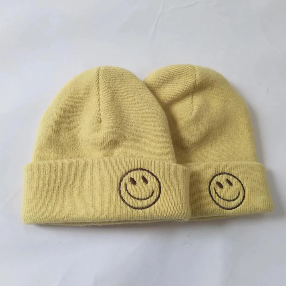 Beanies Knitted Beanie cotton double layer Beanie Hats Wholesale winter knitted hat with smile face embroidery.