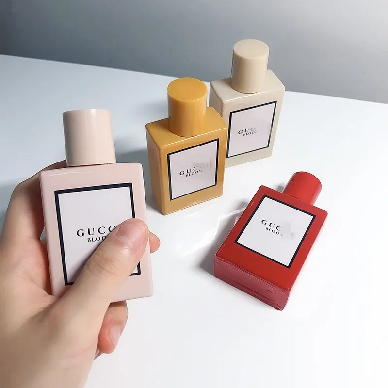 Custom color perfume bottle stickers and printing cosmetic empty glass bottle 30ml shape glass perfume spray bottle