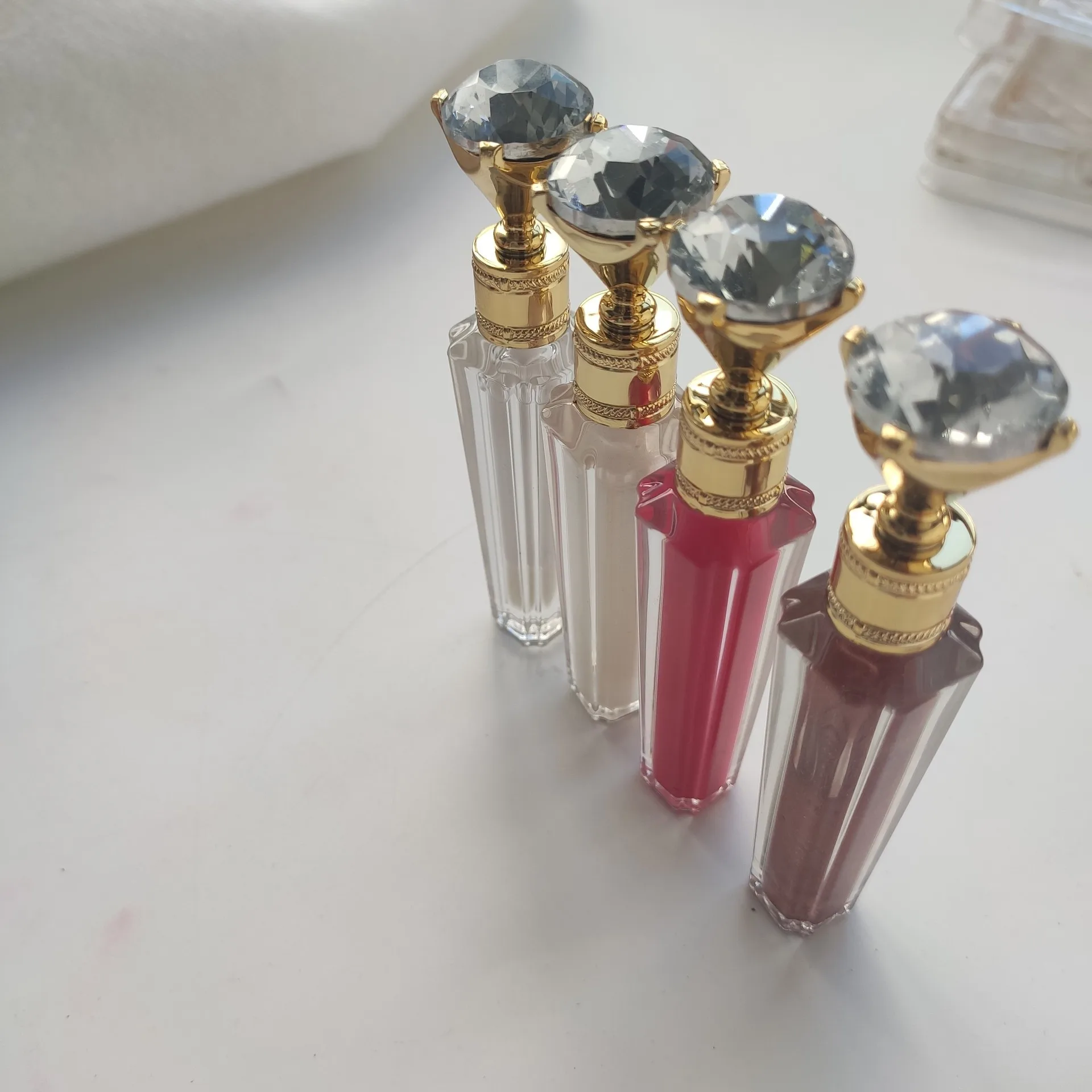 Long Lasting 45 colors Private Label pigment vegan shimmer clear lipstick diamond waterproof lip gloss custom logo lipgloss