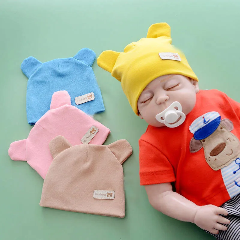 Wholesale solid color soft knitting cotton baby beanie fetal hat with bear ears for unisex newborn infant