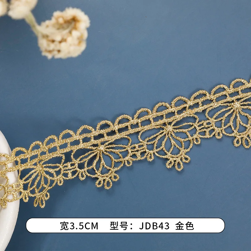 wholesale 35mm polyester golden hollowed out embroidery lace trim fabric for wedding dresses garment