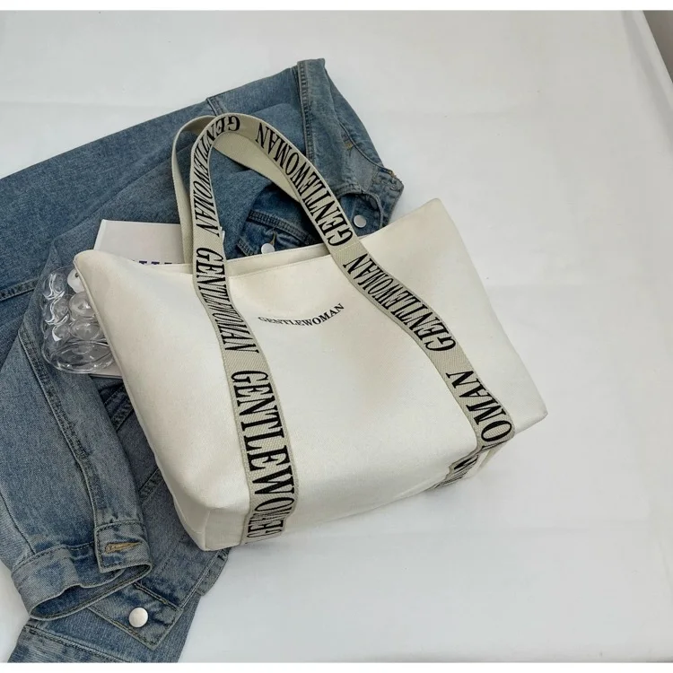 STOCK 44*18*29cm Wholesale  laminated stylish modern organizer large high quality canvas packaging bags women with custom logo