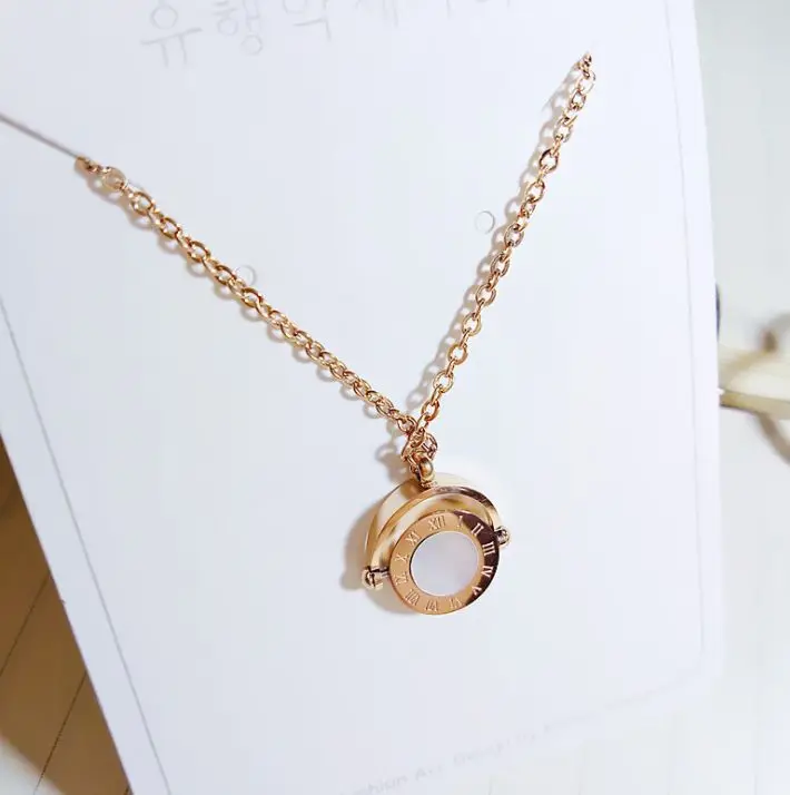 
Titanium steel big circle black and white rotating pendant Korean fashion roman long women sweater thick necklace 