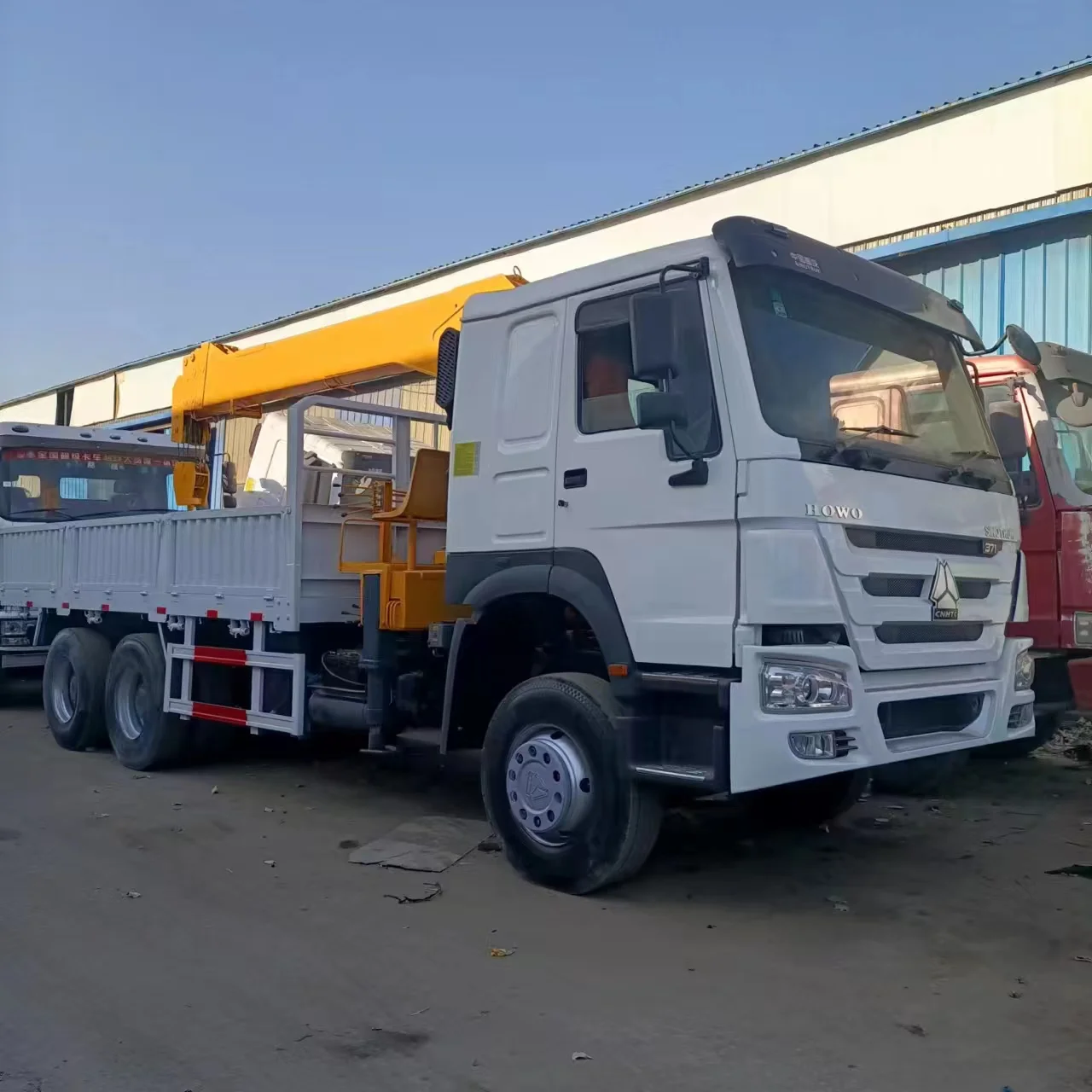 Telescopic boom crane China National Heavy Duty Truck dump truck second-hand straight arm truck mounted crane 15-20 tons