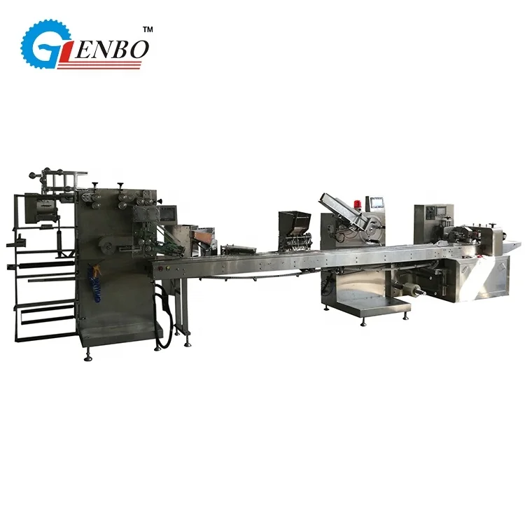 Automatic wet tissue napkin fork spoon cutlery packing machine manufacturer