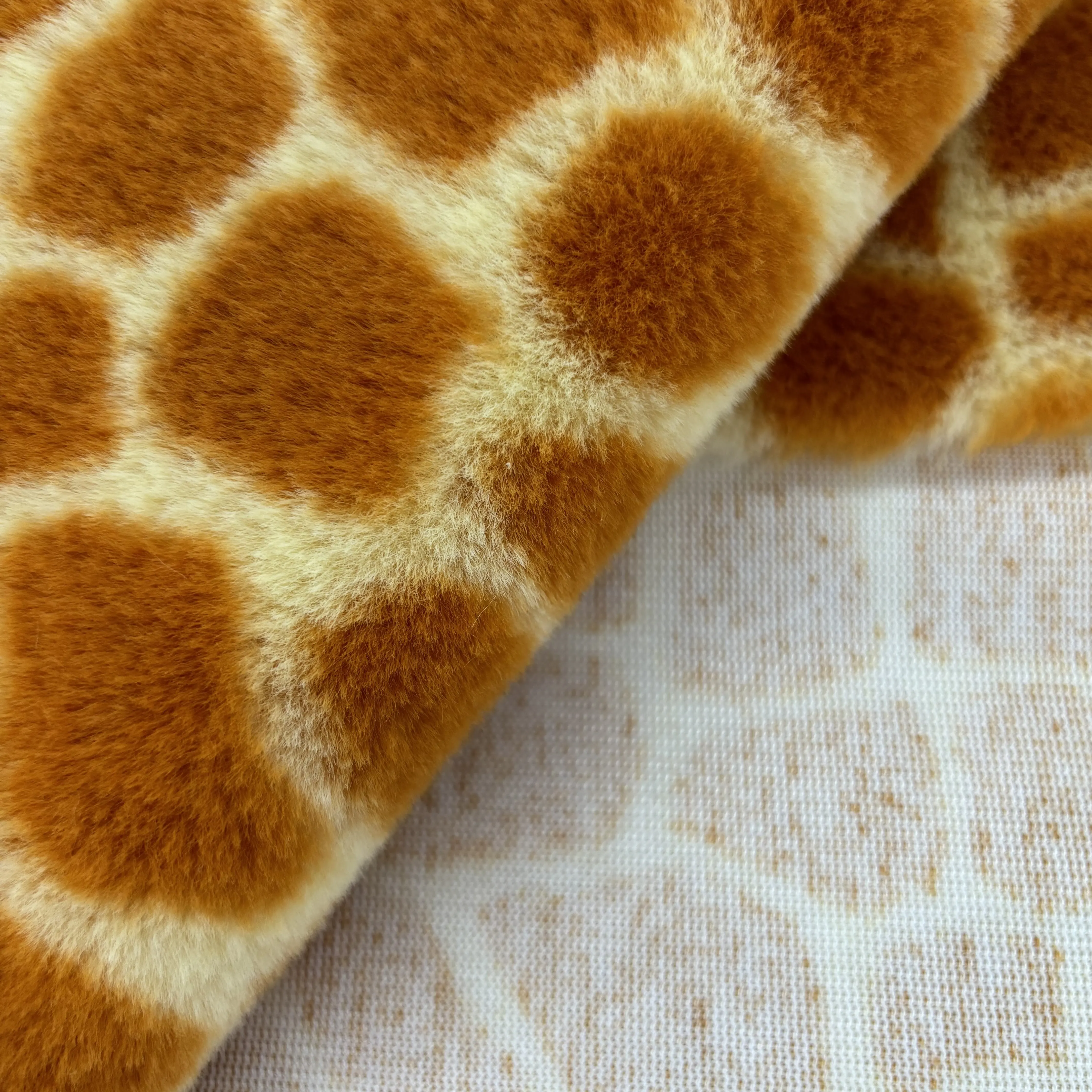 Decorated rabbit feather blanket deer block printed brushed plush plush fabric for toy blanket clothing