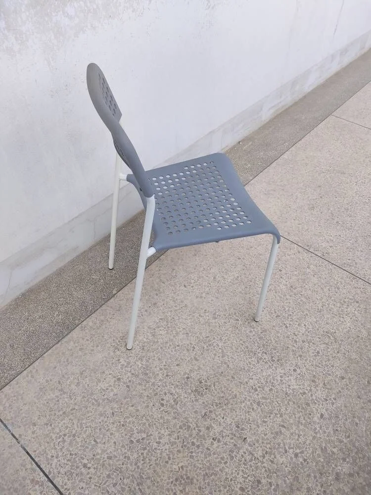 Fancy grey outdoor hotel banquet metal dining chair with holes