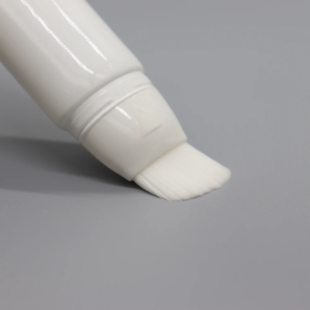 
D30mm Wholesale custom empty white rotary foundation cosmetic plastic tube with brush 