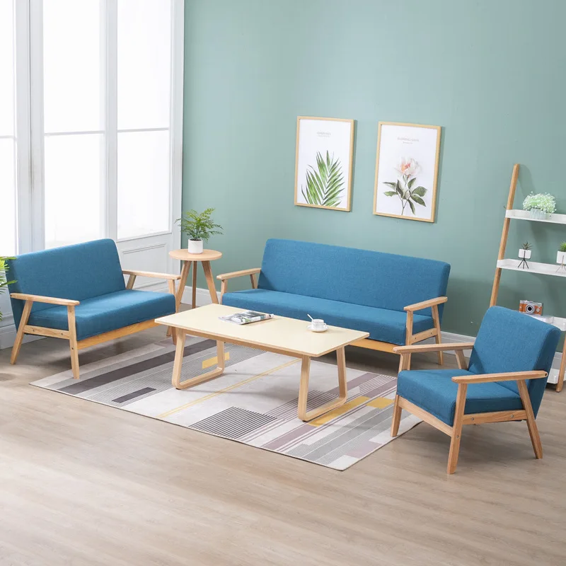Small family simple modern pine sofa new pastoral cloth double single living room solid wood Japanese simple sofa chair set