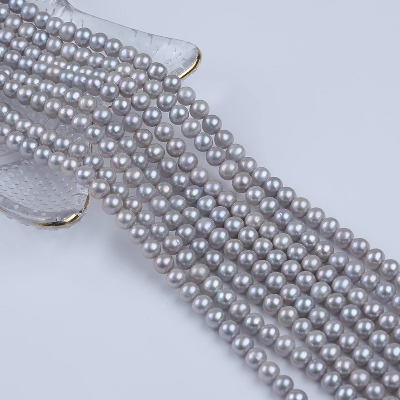 Zhuji 6-7mm Grey White Pink Black Near Round Shape Pearl Stands For Jewelry Making