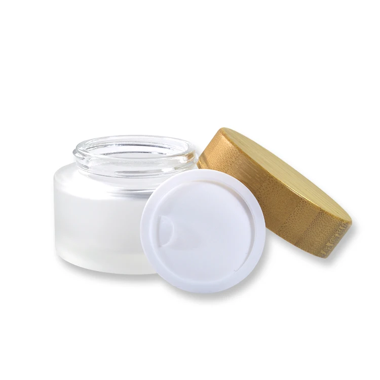 
Cosmetic 5ml 15ml 30ml 50ml 100ml clear frosted glass jar with bamboo wood lid for body cream 