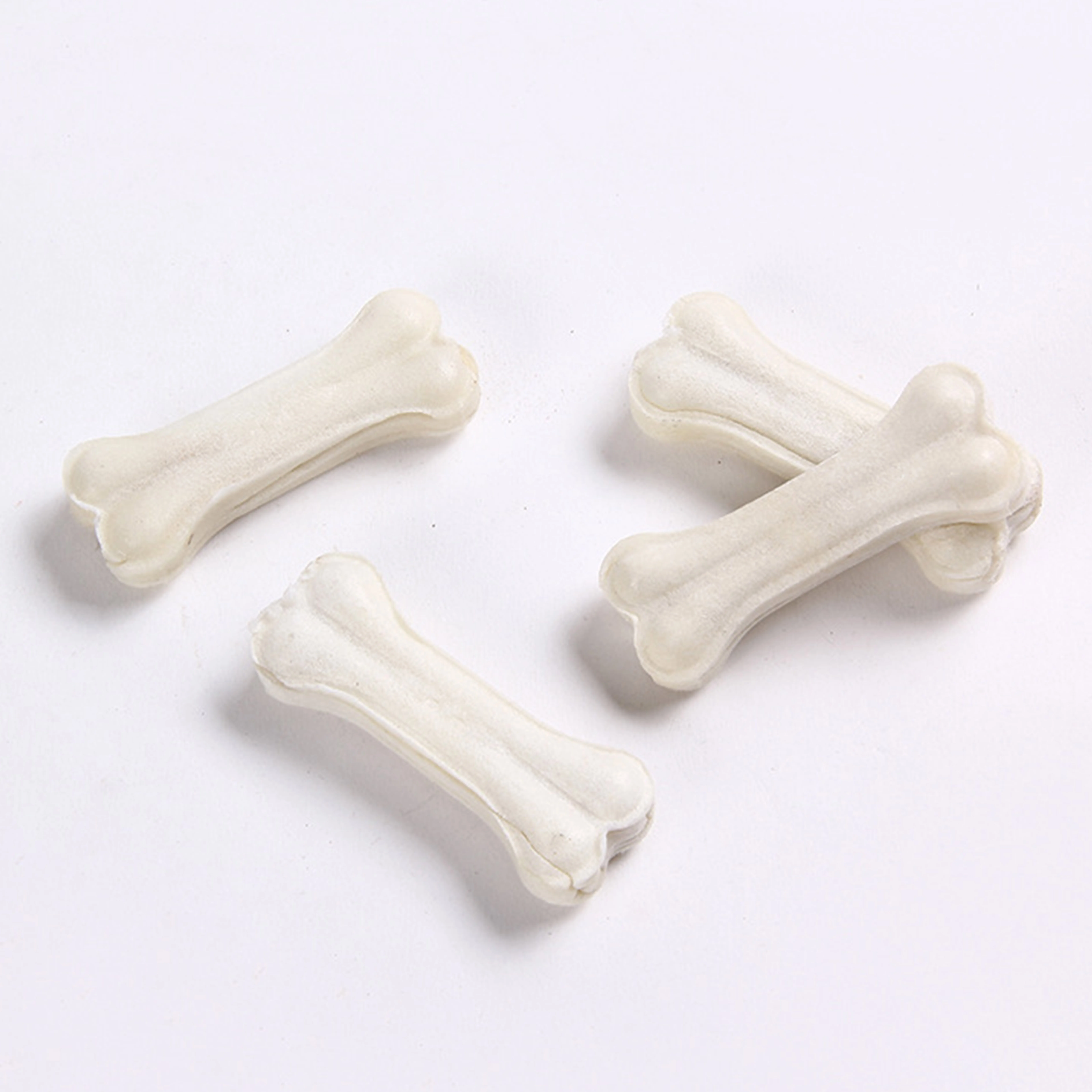 Factory Customized Dog Chew Snack Bleached Rawhide Pressed Dog Bone Natural Cowhide Pet Food