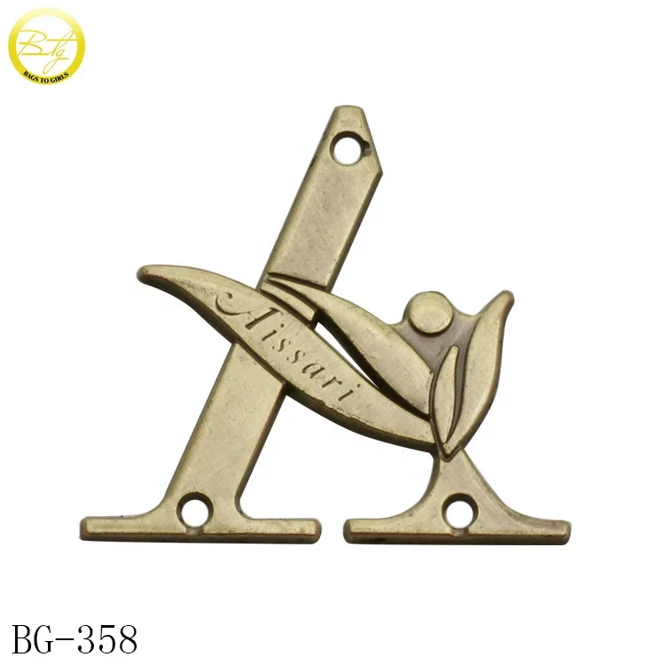 Zinc alloy clothes round tags making customized enamel logo swimwear accessories letter label with holes