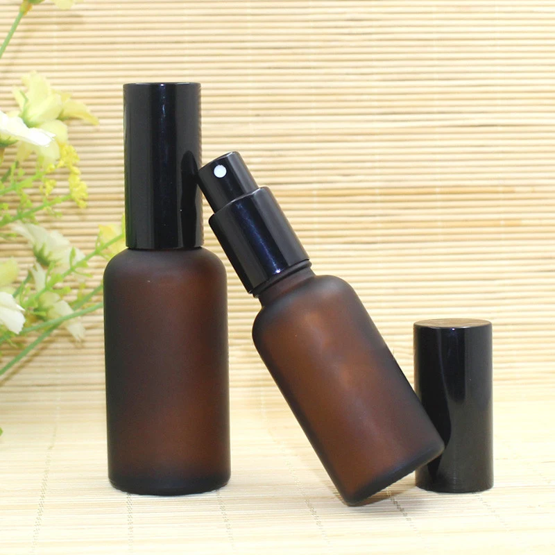 Wholesale empty frosted amber glass essential oil perfume bottles with black Fine Mist Atomizer sprayer 10ml 30ml 50ml 100ml