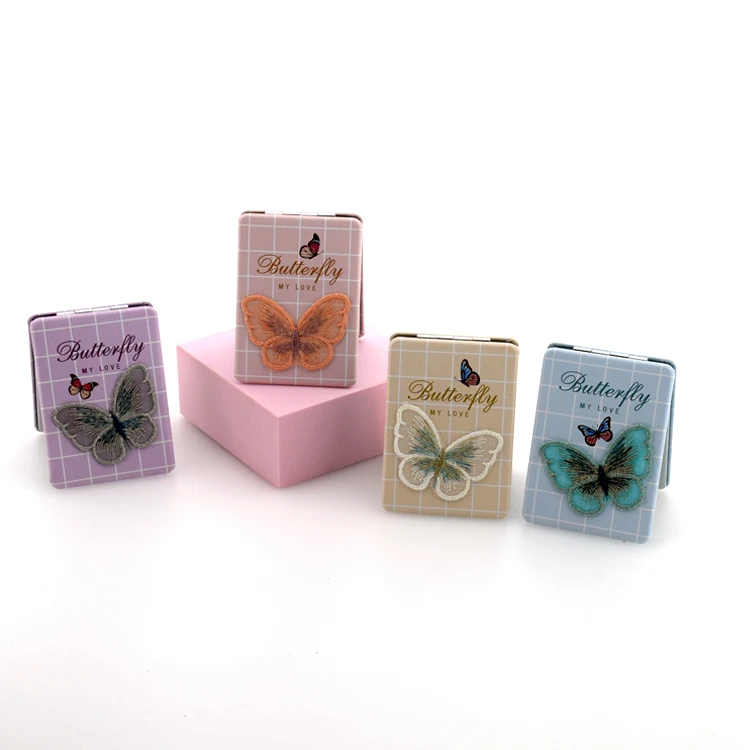 
Fashion hand - held folding cabinet mirror, rectangular double - face makeup mirror. 