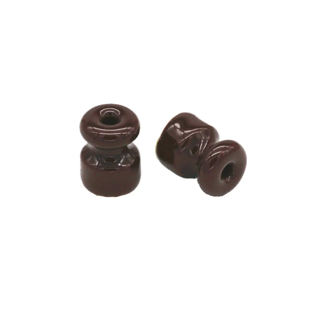 Изолятор из глазурованного фарфора для плетеного кабеля в стиле