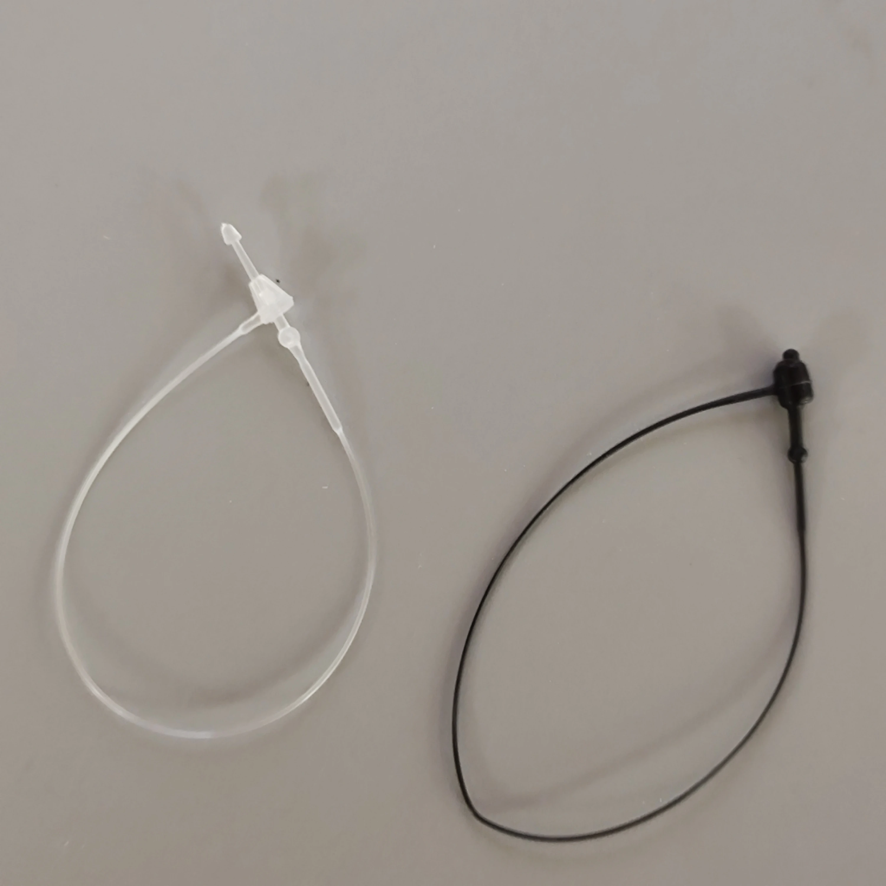 Booster OEM handcuff cable ties kabelbinder screw reel white black clips automatic hang tag string machine stringing threader