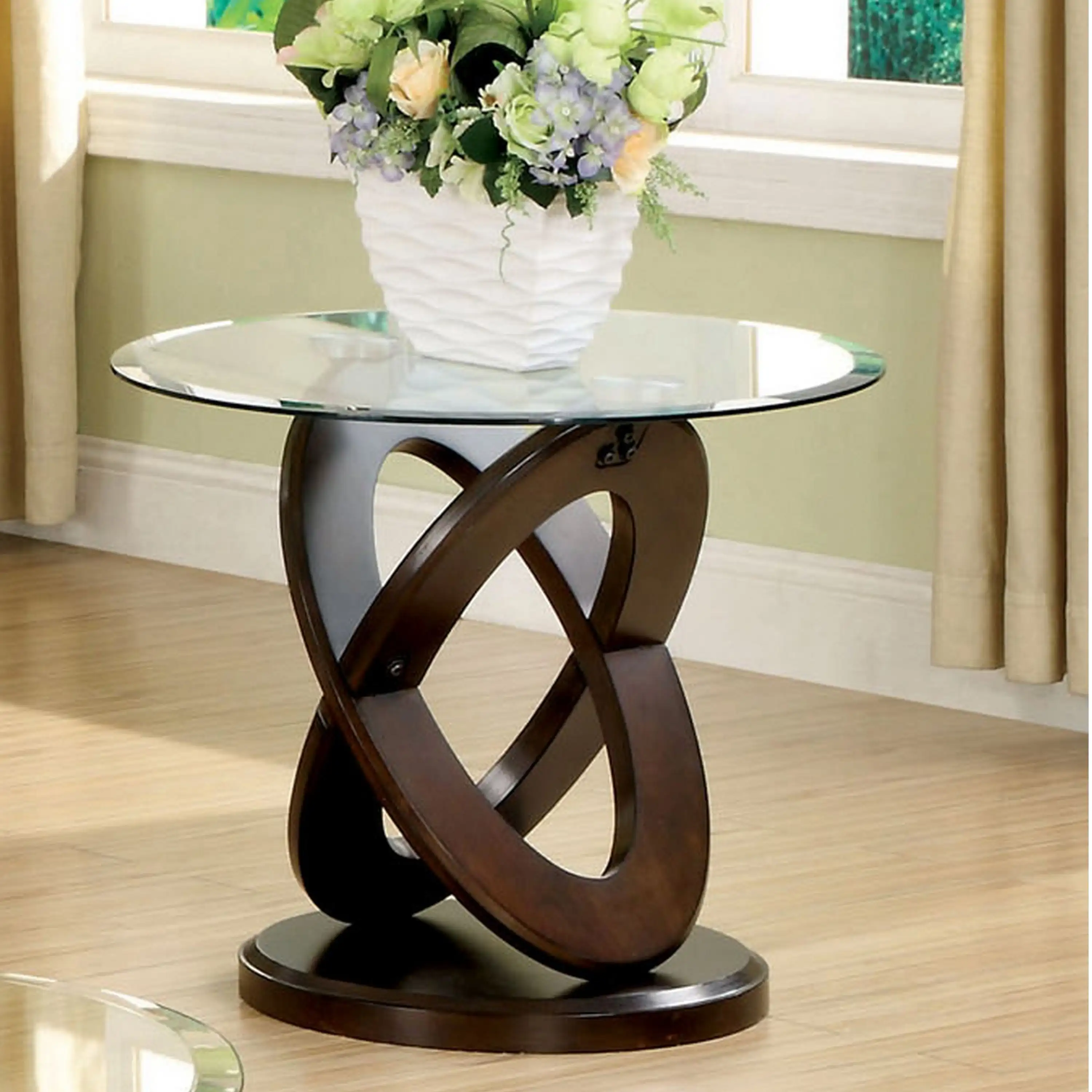 A contemporary Chinese side table with brown crossed oval wooden legs fits any balcony or living room space