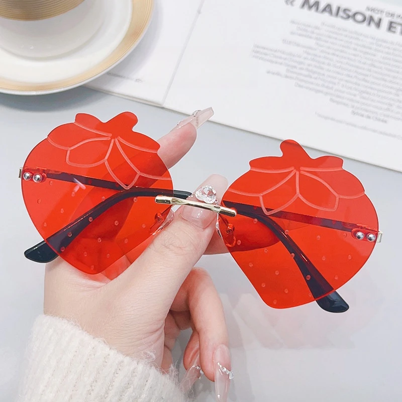 Trendy Unisex Gold Rimless Sunglasses with UV400 Red Lenses Strawberry Style Fashionable Eyewear for Parties