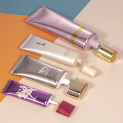 Custom Flat Oval Aluminum Plastic Laminated Cosmetic Sunscreen Liquid Foundation Packaging Tubes With Screw Lid