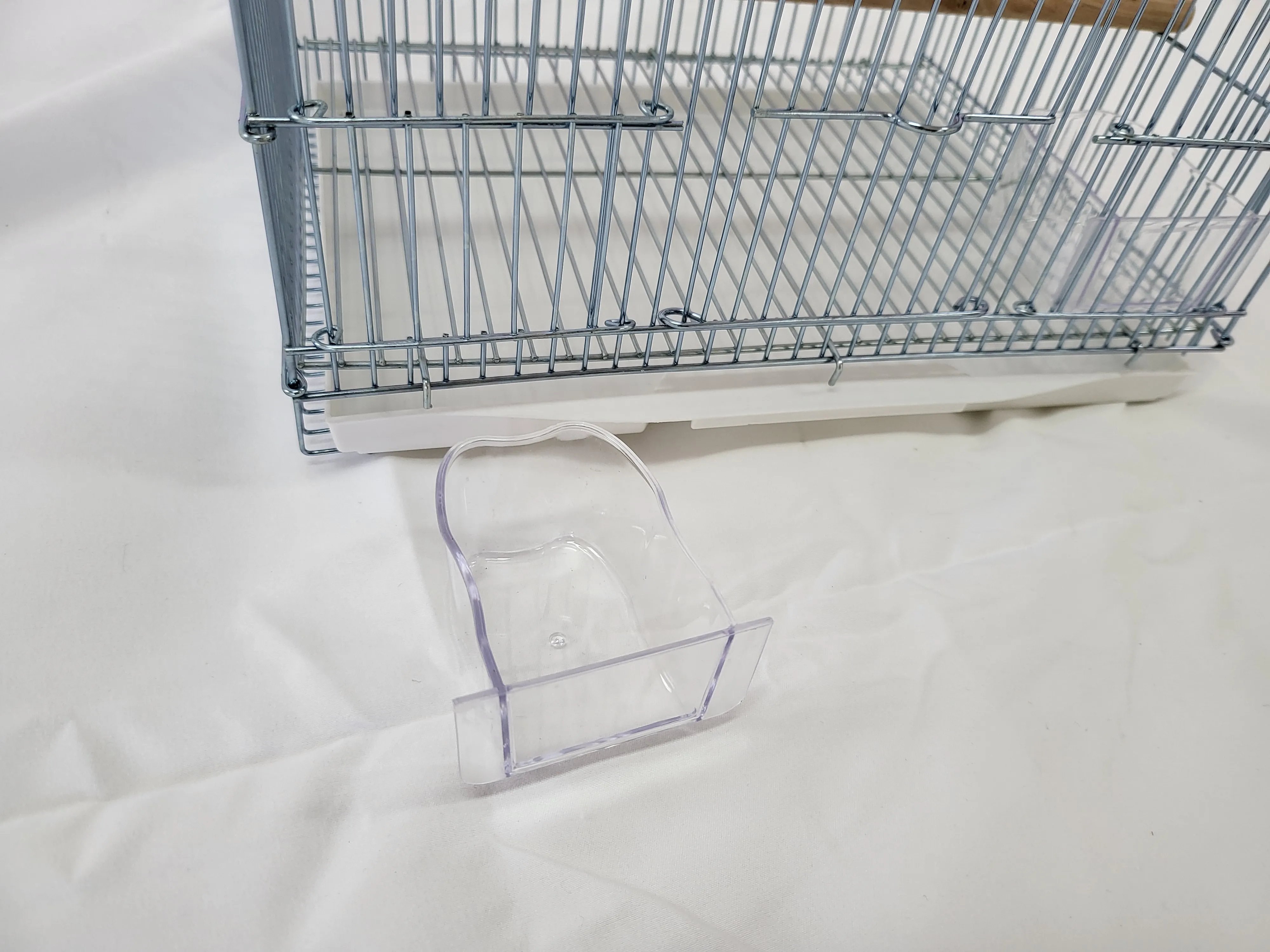 Luxury metal foldable bird cage portable indoor and outdoor wire parrot canary breeding and feeding cage with tray