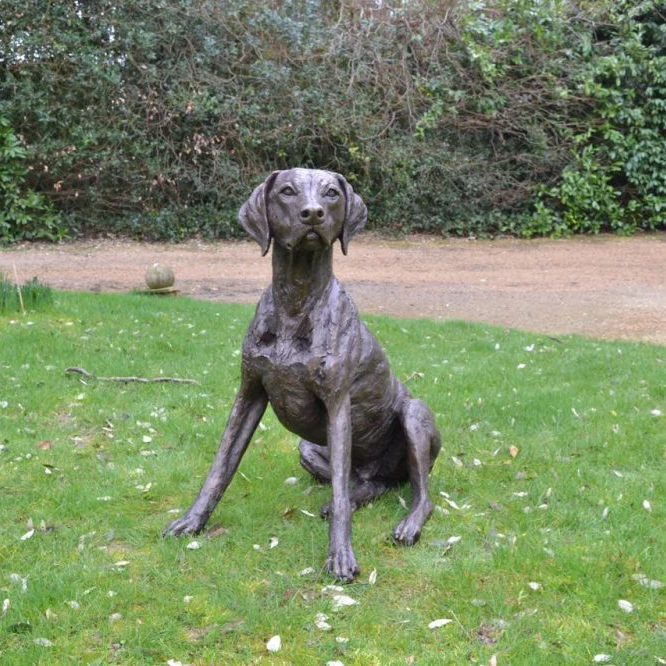 Brown dog bumpy bronze statue for the garden
