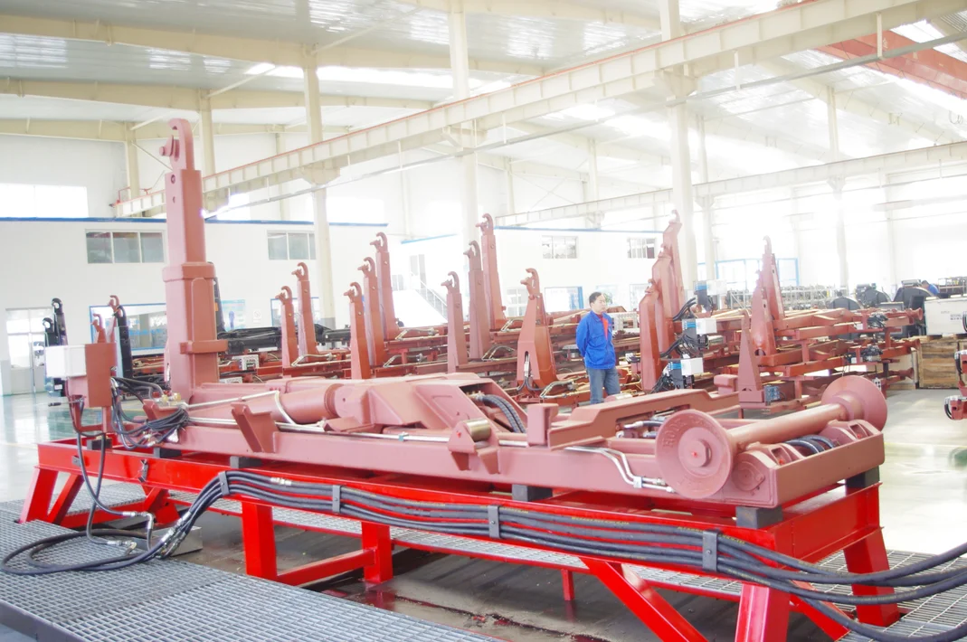 Hydraulic hook lift hoist mounted on heavy duty trucks designed for  transportation of materials in the waste, recycling, scrap