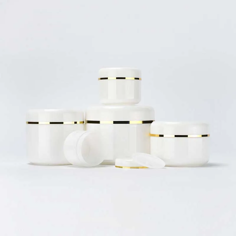 Wholesale cosmetic packaging 10g 20g 50g 100g 150g 200g fancy white face cream body cream plastic cosmetic jars with gold line