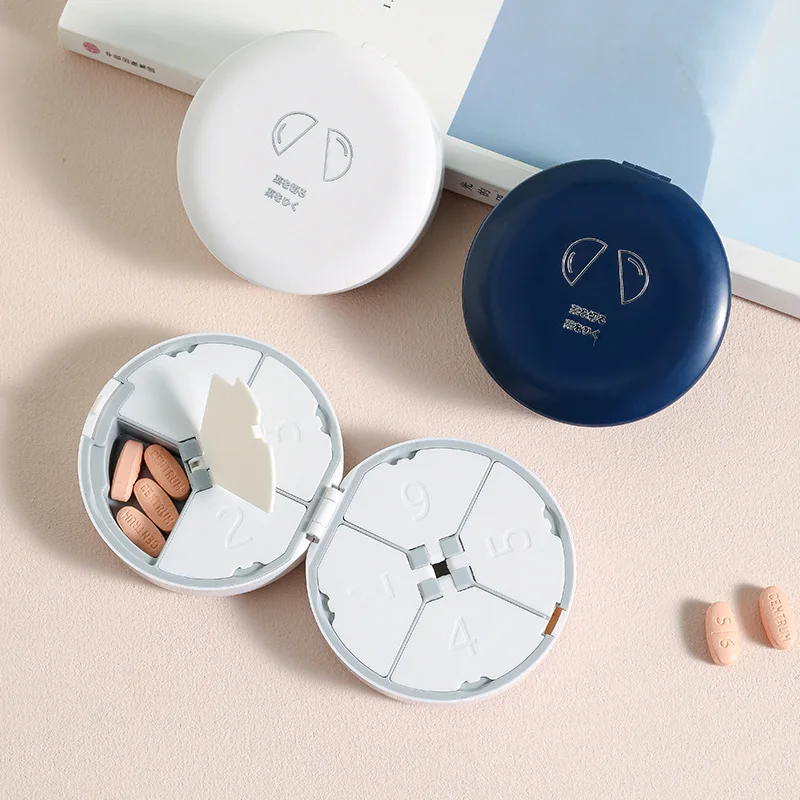 Promotional plastic round medicine case box pill crusher weekly 7 day pill box case with cutter splitter