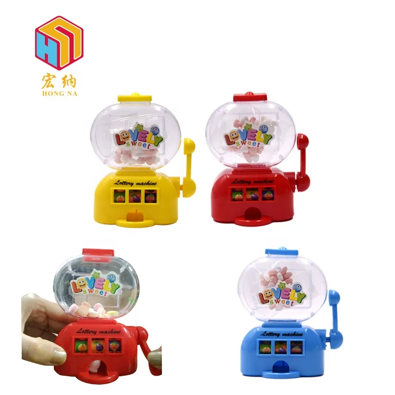 pressed sweet machine toy candy grabber toy with hand shake