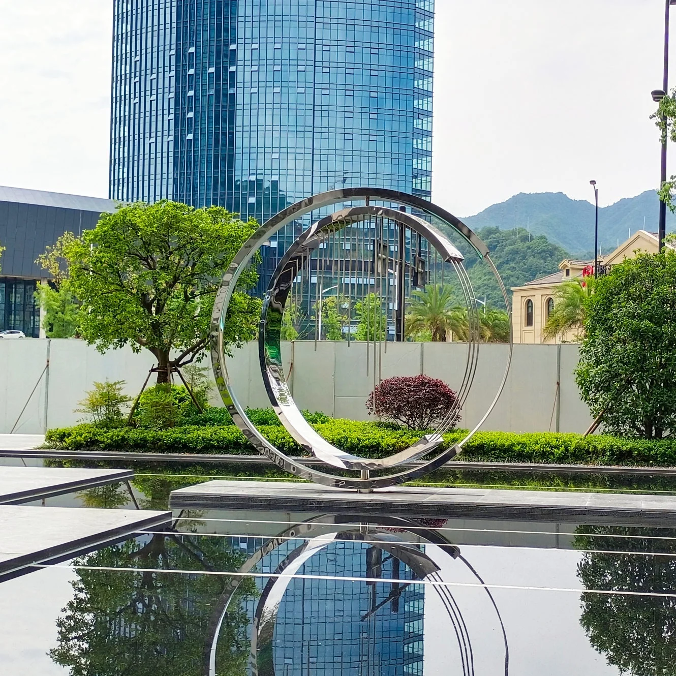 Hot sale Modern metal art Move Dynamic ring statue landscape decoration outdoor pool mirror polished stainless steel sculpture