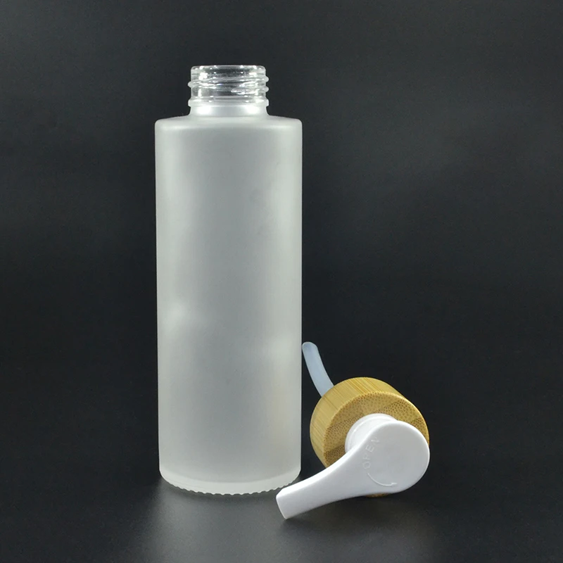 Wholesale Cosmetic Lotion Packaging 30ml 50ml 100ml 120ml 150ml Frosted Glass Spray Bottle With Bamboo Lid