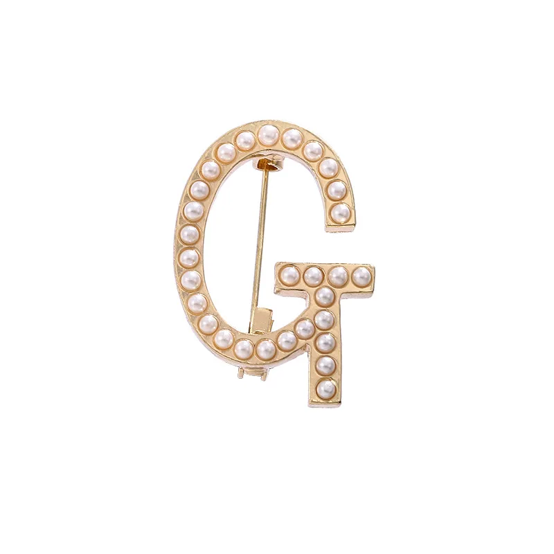 European and American hot-selling fashion English alphabet metal gold enamel lapel pin with shinny pearl