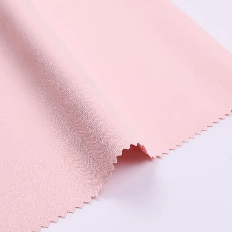Shaoxing yuyuan imp Hot Sale Wholesale 100d 130gsm Plain Solid 4 way nsLycra Fabric Indian nsLycra Fabrics Garments ns fabric