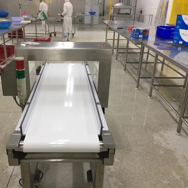 Conveyor tunnel metal detecting for aluminum foil packaging detector