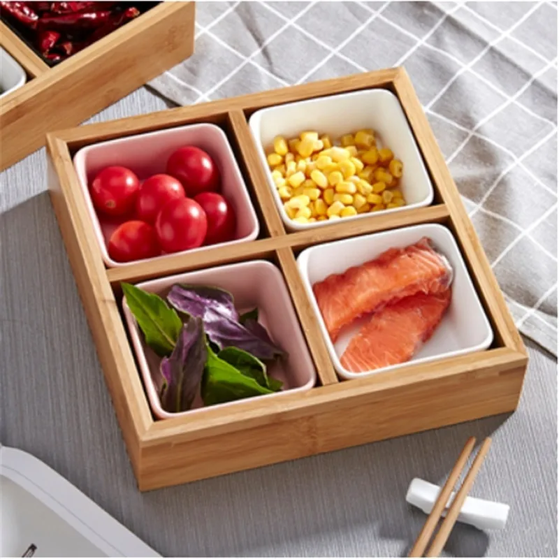 
Dried fruit, fruit and vegetable platter of bamboo and wood 